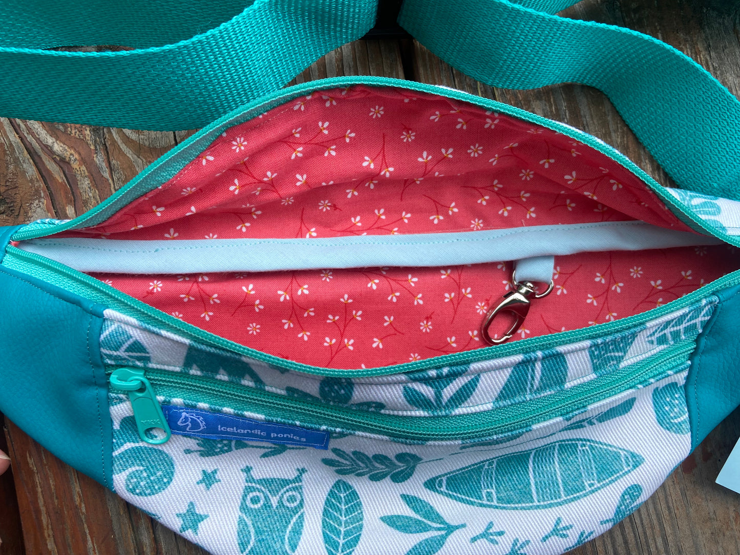 Aqua canoe, owl and guitar cross body bag